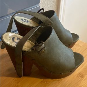 Size 8.5 tall green Guess wedges with wooden heel